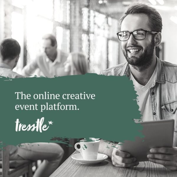 Tresstle.com the online event platform for the creative community. Black & white image of a man in a coffee shop with his computer and text: The online creative event platform.