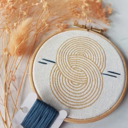 A 4 inch hoop machine embroidered with entwined circles