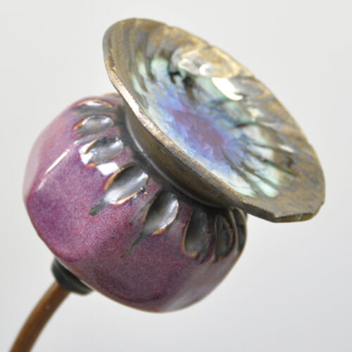 sculptural purple ceramic poppy seed head