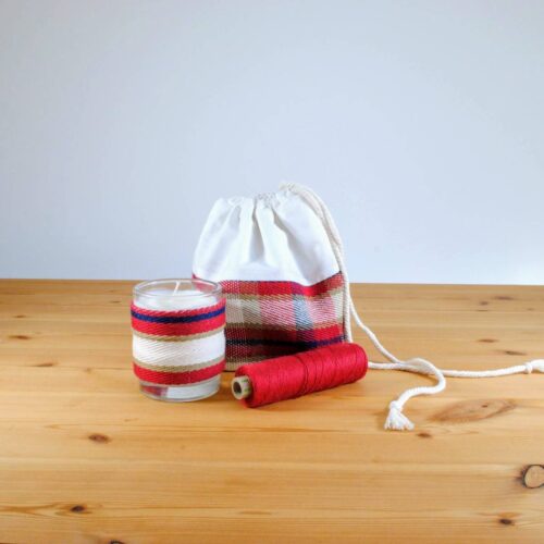 Handwoven drawstring travel bag and matching scented candle