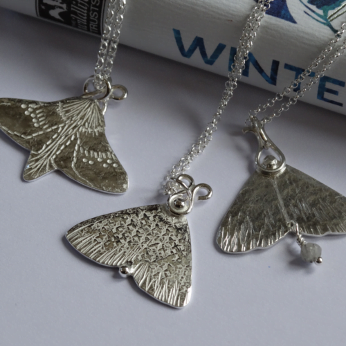 Winter moth pendants in recycled silver