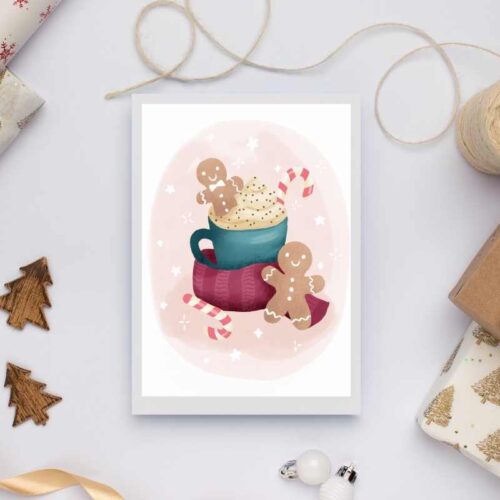 Christmas card featuring hot chocolate mug with gingerbread men